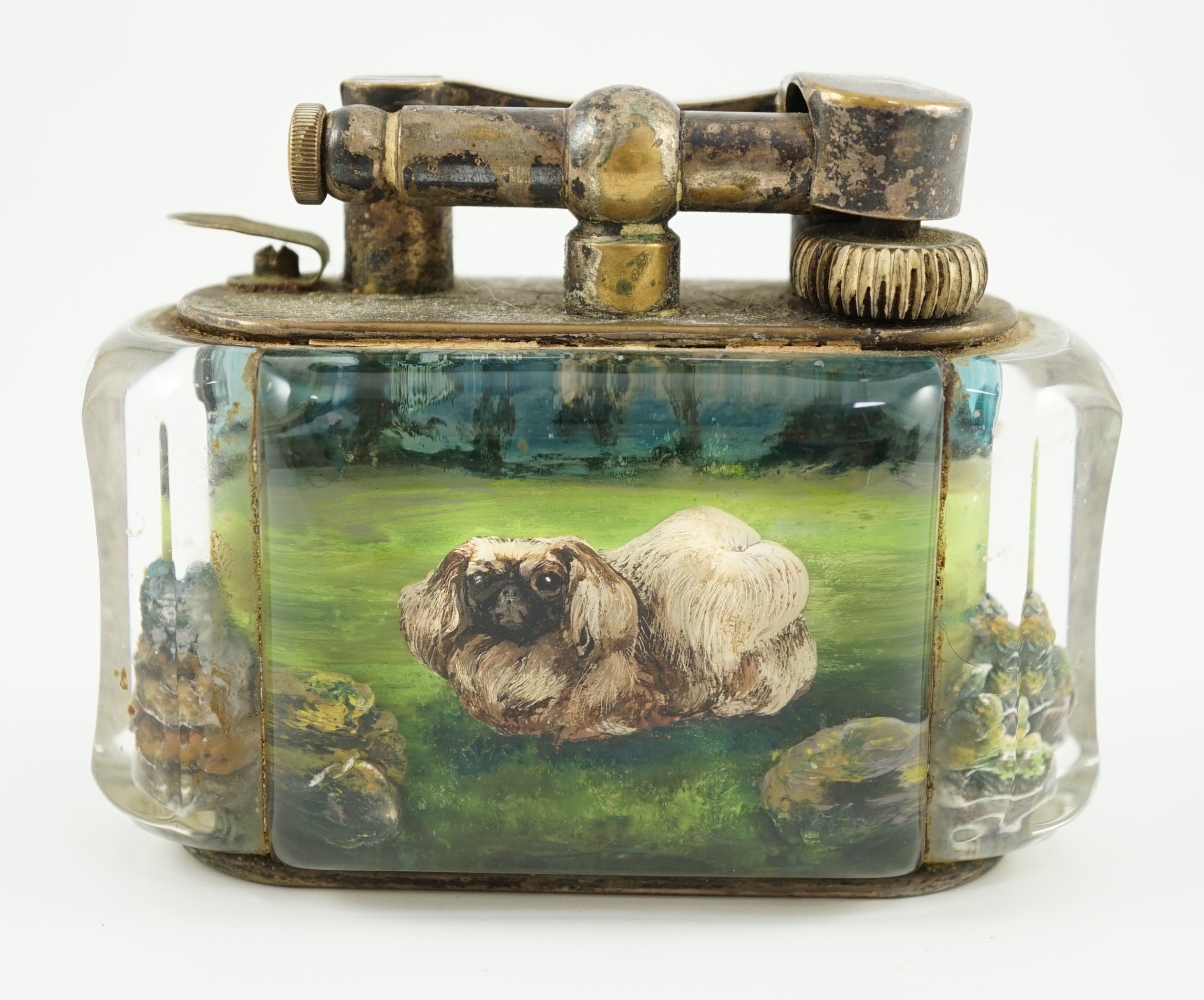 A rare Dunhill lucite cigarette lighter with unusual decoration of a Pekingese dog, width 10cm depth 5cm height 7.5cm